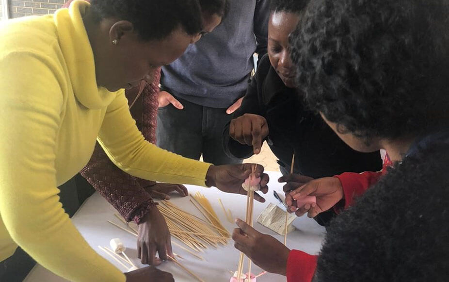 beneficiaries participating in an activity on team building facilitated by 3rd year psychology students from university of pretoria-crop-u58633 (1)