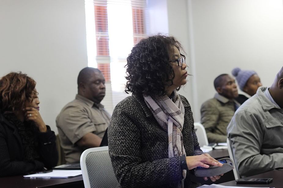 executive director attending a stakeholders meeting