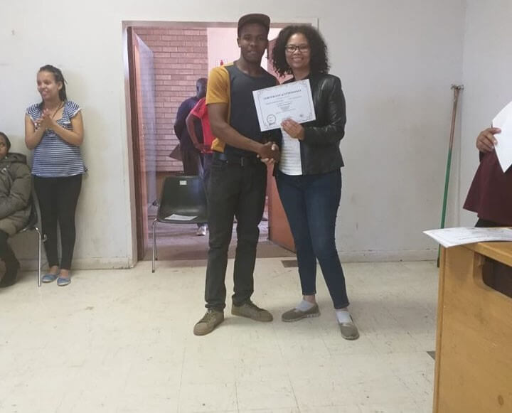 life skills beneficiary receiving their certificates upon completing the workshop (1)