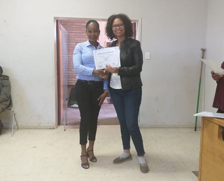 life skills beneficiary receiving their certificates upon completing the workshop 2 (1)