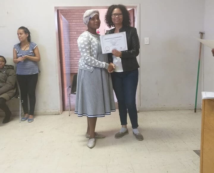 life skills beneficiary receiving their certificates upon completing the workshop 3 (1)